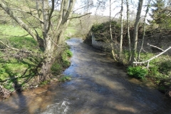 25. Flowing past Kentsford Farm