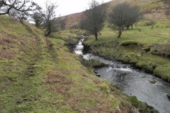 33. Flowing below Pig Hill
