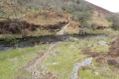46. Flowing below Middle Hill