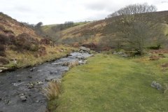 50. Flowing below Middle Hill