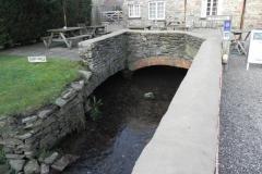 30.-Emerges-from-beneath-Town-Mill