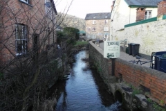 25. Looking downstream to Footbridge to Monmouth Terrace