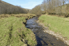 14. Flowing below Moorhouse Ridge