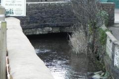 32. Flows beneath Bridge Street