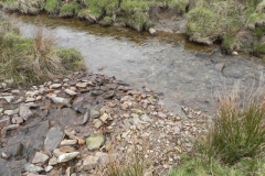 100. Small stream joins from the south